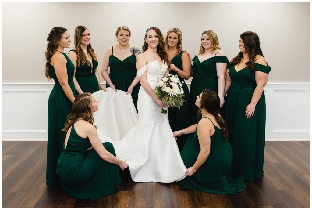 bride surrounded by bridesmaid at laube hall, freeport, pa