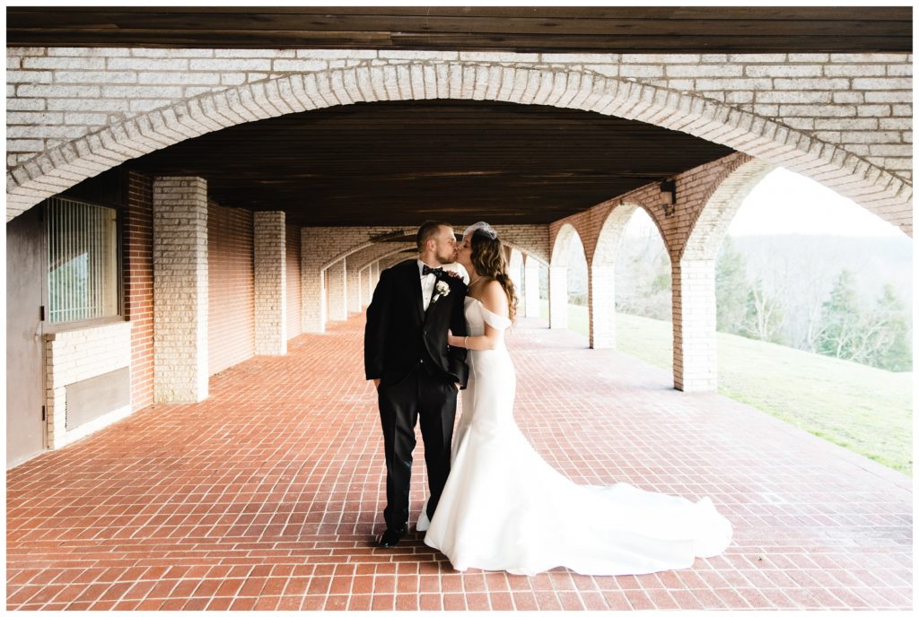 kissing under arches at laube hall, freeport, pa