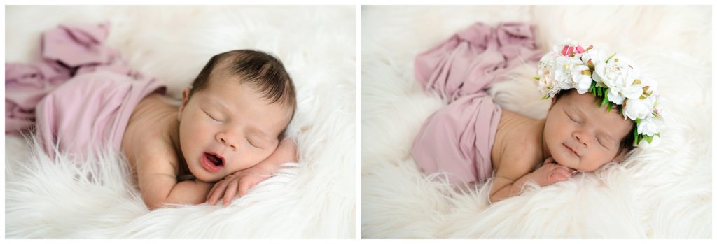 newborn girl sleeping on cream fur with flower crown