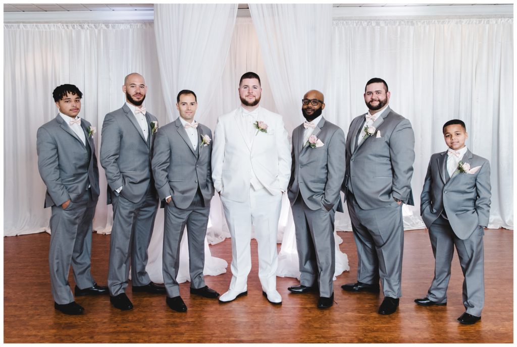 groom and groomsmen wearing gray suits at salvatore's events and catering