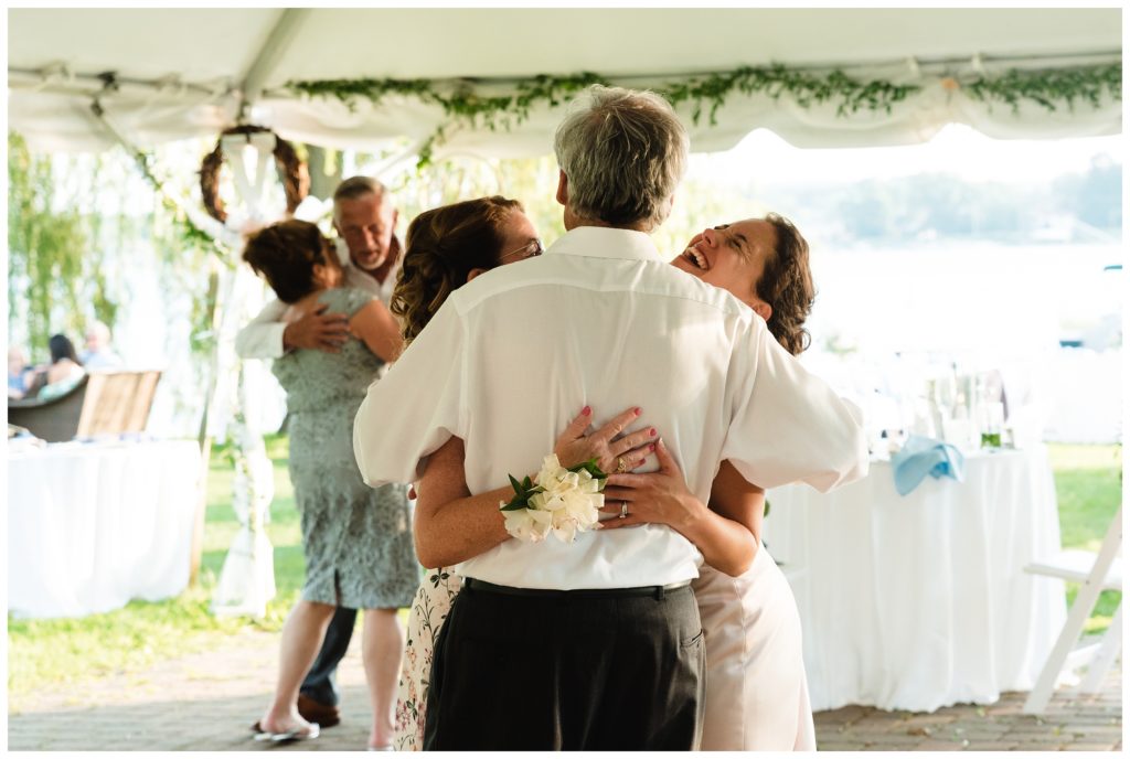 bride dancing with parents
