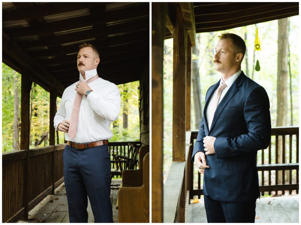 groom getting ready on cabin porch