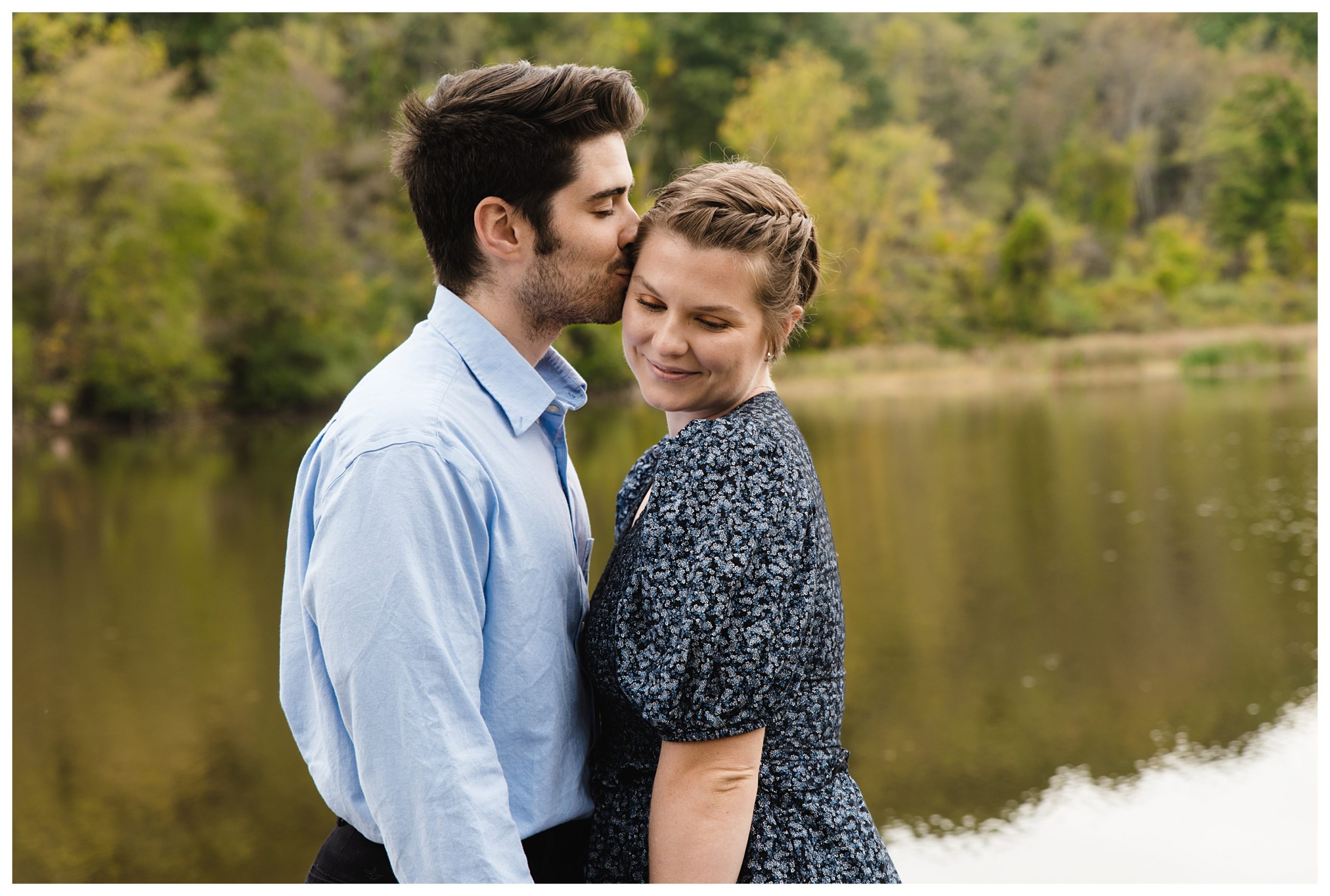 groom-to-be kissing bride-to-be on cheek during engagement session