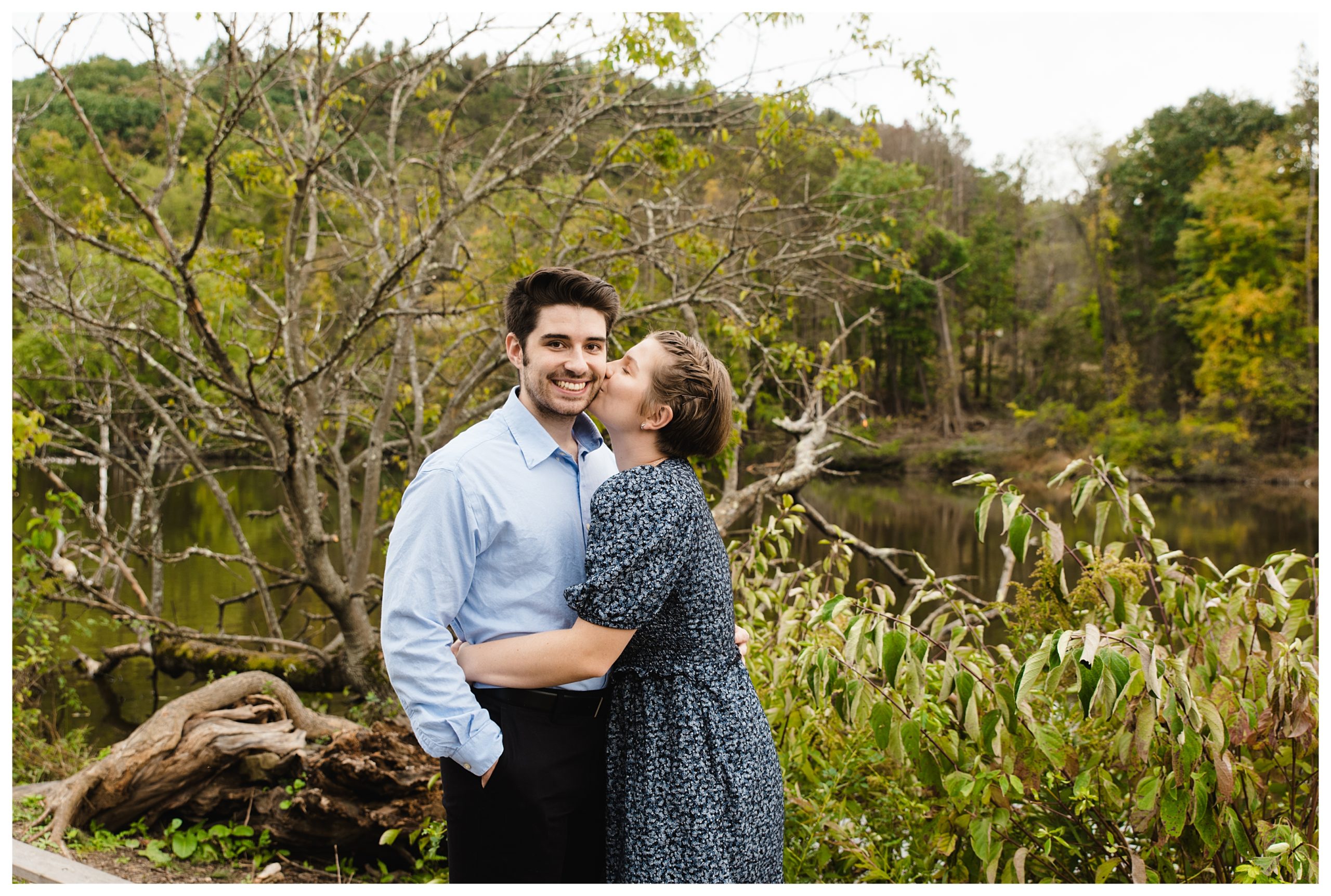 woman gives man a kiss on cheek during Marshall Island engagement session
