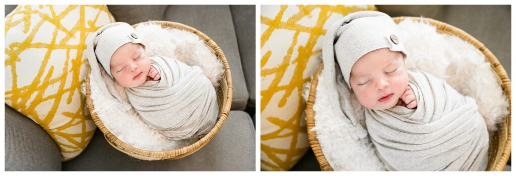 newborn boy swaddled in gray with a sleepy cap. he's sleeping in a wicker basket on the couch
