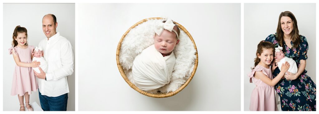Newborn girl wrapped in white with a white bow sleeps in a round boho basket during Pittsburgh studio session.
