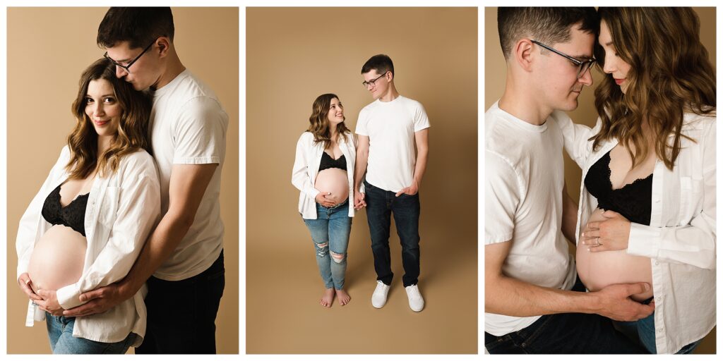 Husband and expecting wife wears jeans and white button down with belly exposed during maternity session in Pittsburgh.