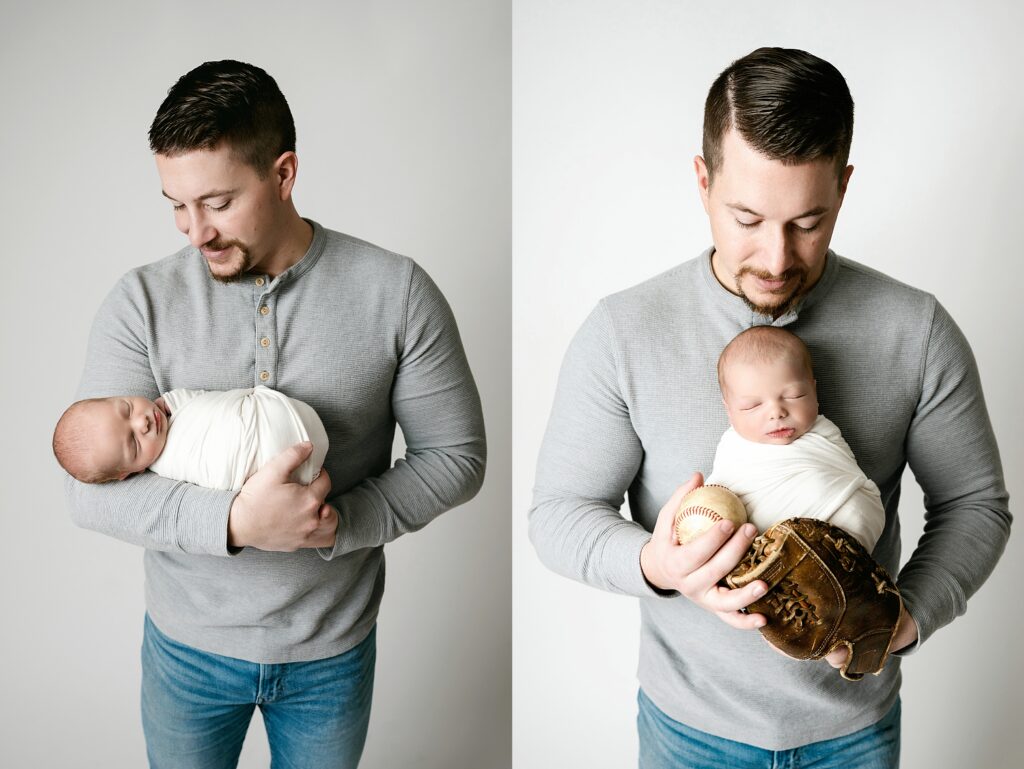 Dad holds newborn son in baseball glove during pittsburgh baby photography session.