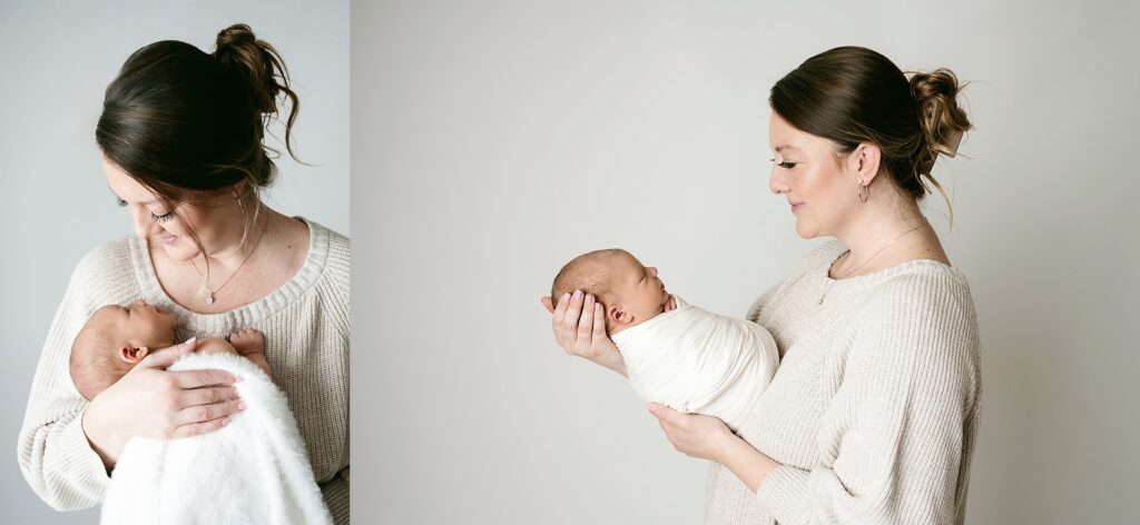 Mom gazes down lovingly at her newborn son during pittsburgh baby photography session